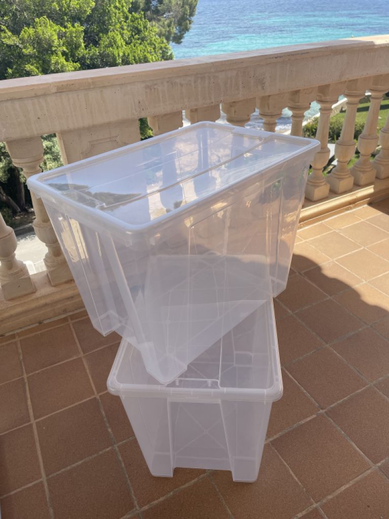 2 large plastic containers with lids