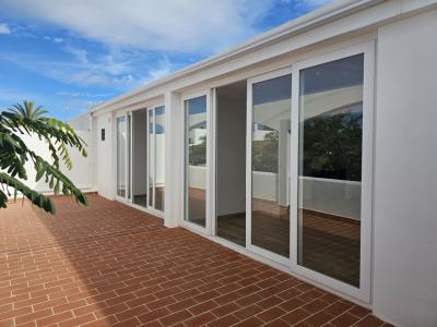 Cala Dor - Stylisches Apartment, neue Geräte, XXL Terrasse und Wintergarten, Strand fußläufig