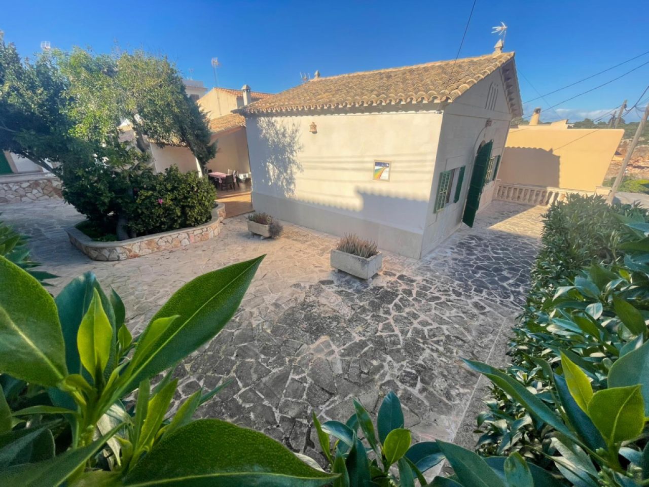 Ebenerdiges Chalet mit Garten, Terrasse und Meerblick in Cala Figuera-- CH 48