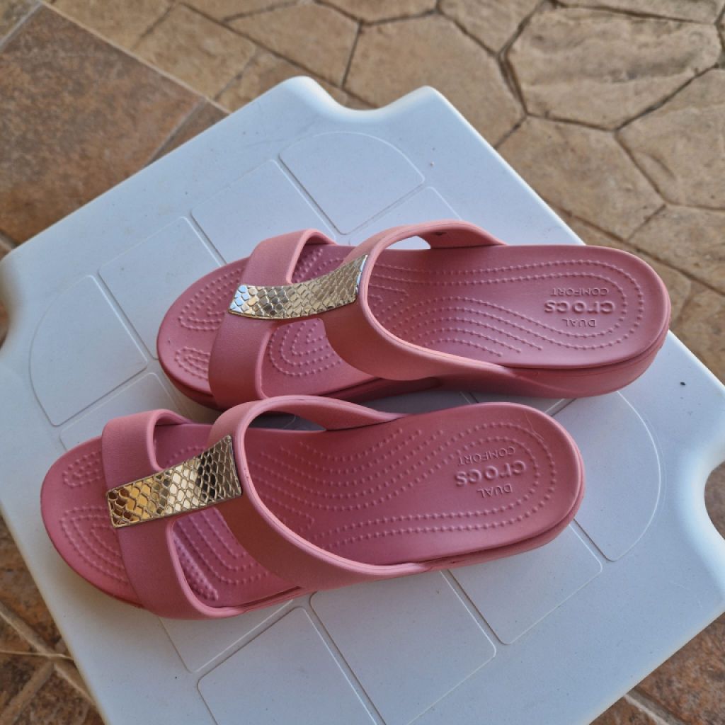 Elegante Crocs, nagelneu Gr. W9