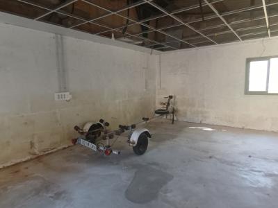 Plot in a central location with a large storage room in Es LLombards --- S 13