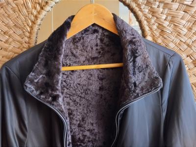 Chaqueta de marca de alta calidad como nueva