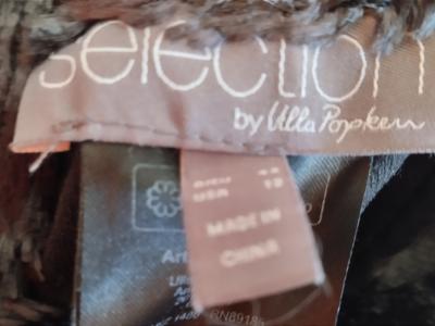 Chaqueta de marca de alta calidad como nueva