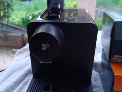 Coffee capsules with machine