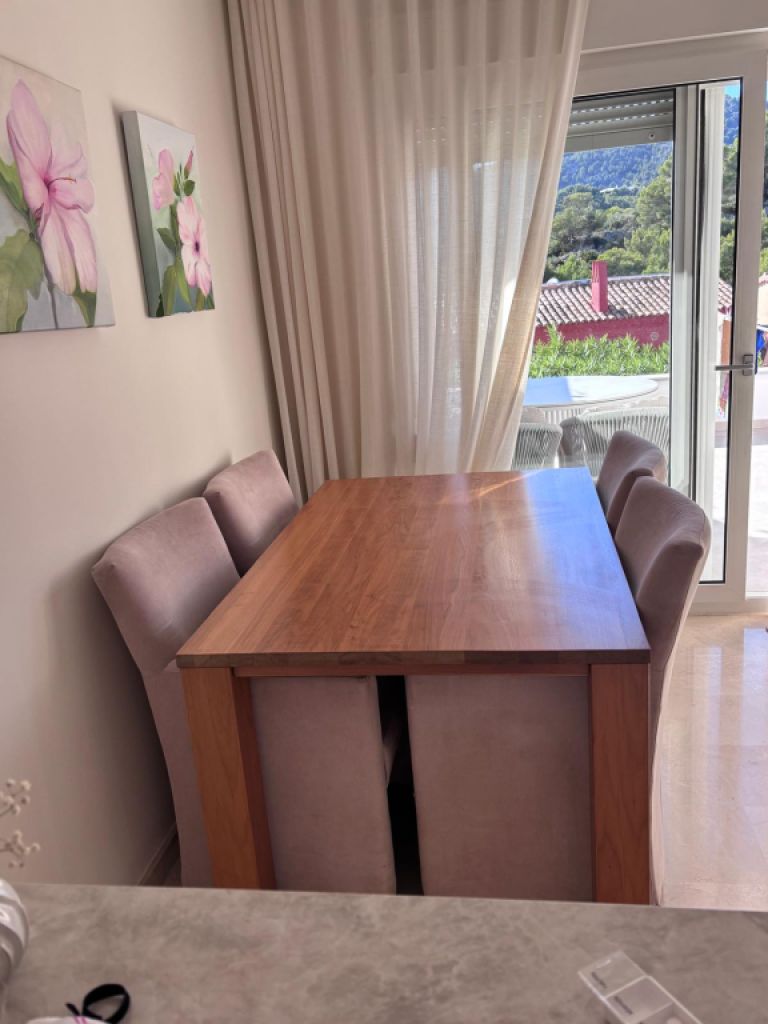 Solid wooden dining table, already disassembled