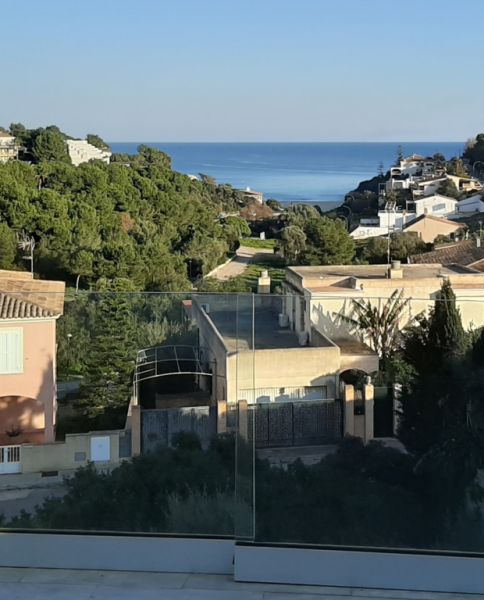 Adosado moderno con piscina privada y vistas al mar en Cala Mandia