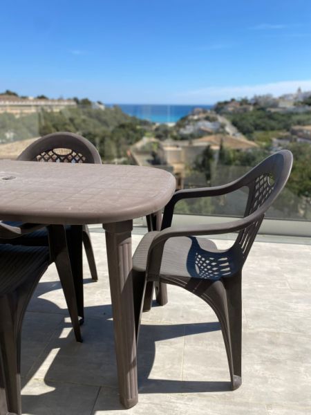 Adosado moderno con piscina privada y vistas al mar en Cala Mandia