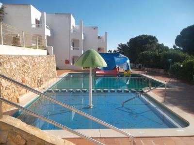 Moderno y luminoso apartamento en planta baja con piscina comunitaria en Cala Dor -- AP 33 VK