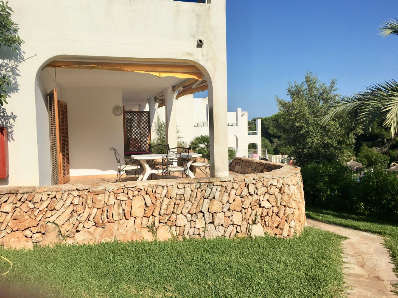 Moderno y luminoso apartamento en planta baja con piscina comunitaria en Cala Dor -- AP 33 VK