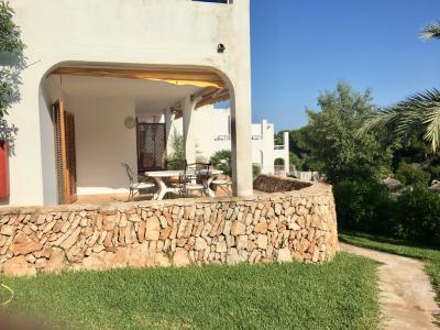 Moderno y luminoso apartamento en planta baja con piscina comunitaria en Cala Dor -- AP 33 VK