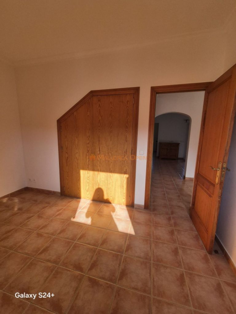 Reihenhaus-Chalet im Wohngebiet von Cala Mandia