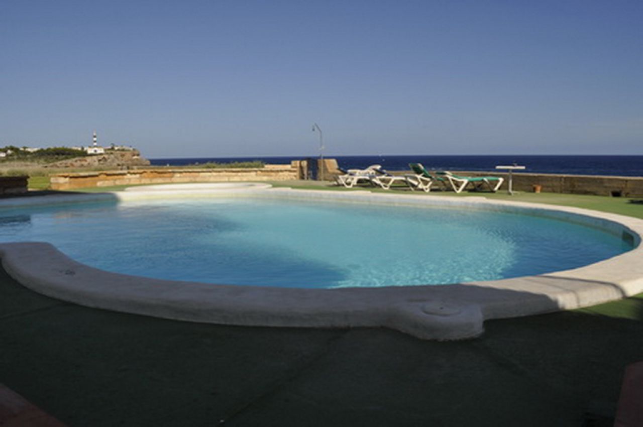 SEASON from SEPT 26 : Ground floor apartment with fireplace, pool and sea view in Porto Colom -- AP 