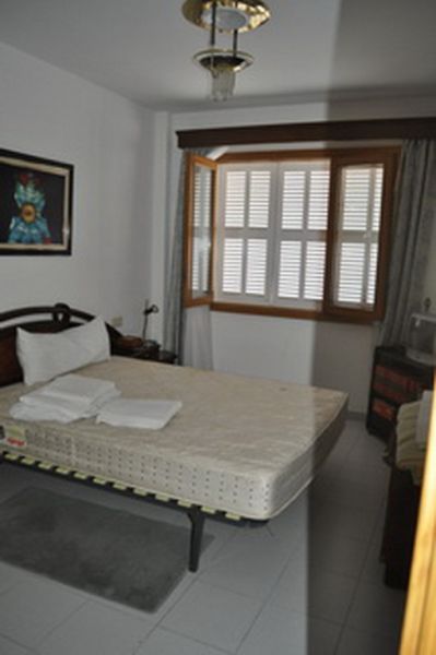 SEASON from SEPT 26 : Ground floor apartment with fireplace, pool and sea view in Porto Colom -- AP 