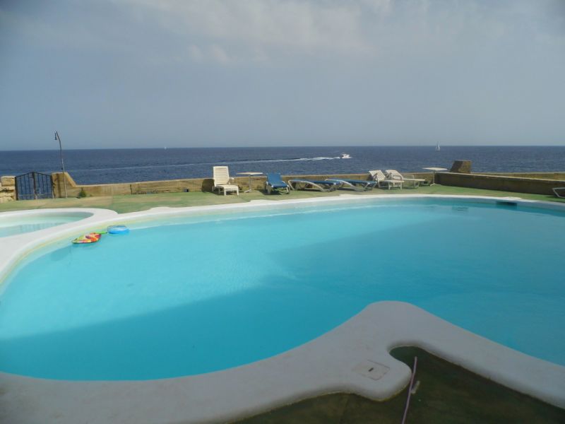 SEASON from SEPT 26 : Ground floor apartment with fireplace, pool and sea view in Porto Colom -- AP 