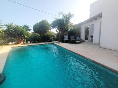 Saison: Chalet mit Fussbodenheizung, Garten und Pool in Cala LLombards -- CH 07 T