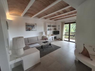 Winter: 2-level chalet with oil central heating, garden and pool in Cala Dor - near the harbor -- CH 23 WT