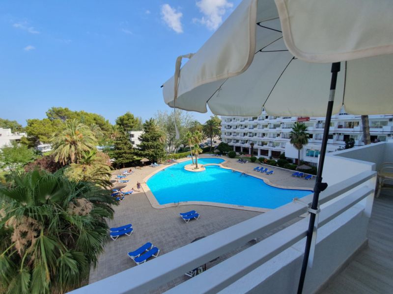 Invierno: Moderno apartamento con piscina gema y pista de tenis en el puerto de Alcudia -- AP 23 WT