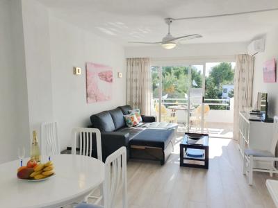 Invierno: Moderno apartamento con piscina gema y pista de tenis en el puerto de Alcudia -- AP 23 WT