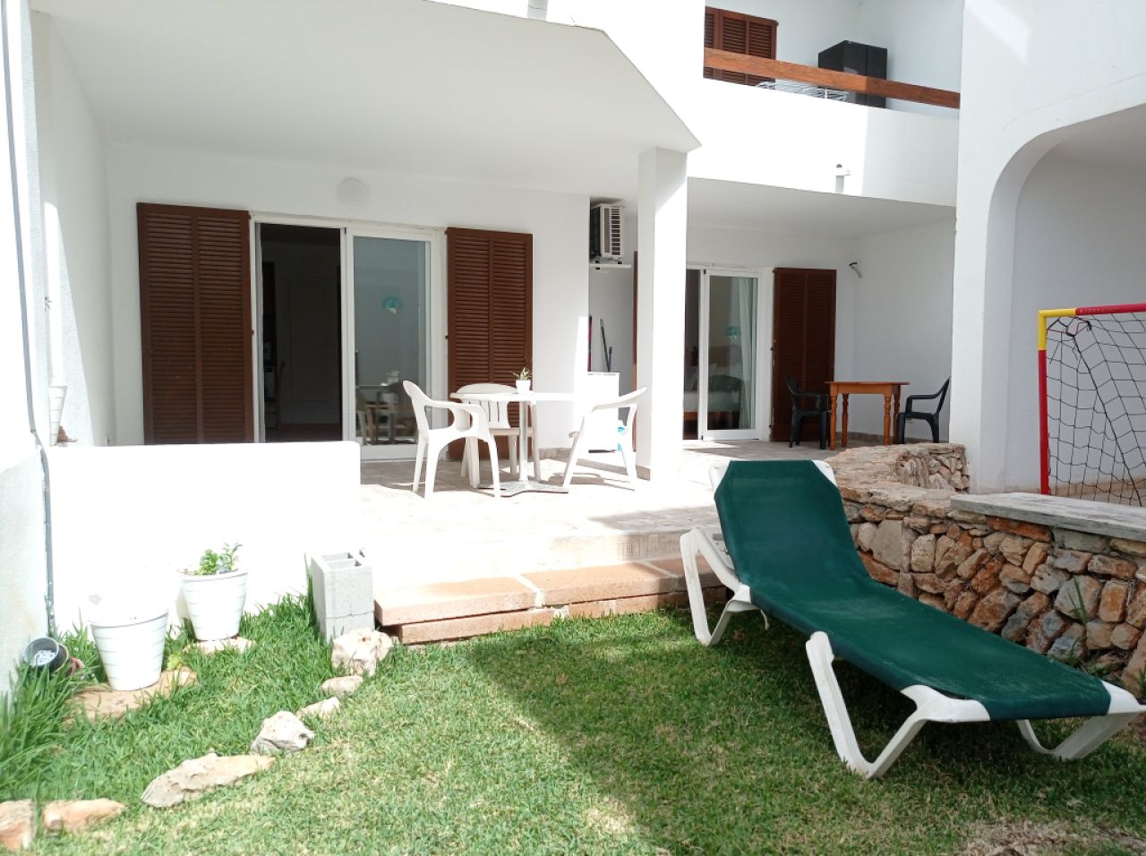 Temporada de invierno: Apartamento en planta baja con terraza cerca del puerto de Cala Dor --- AP 14