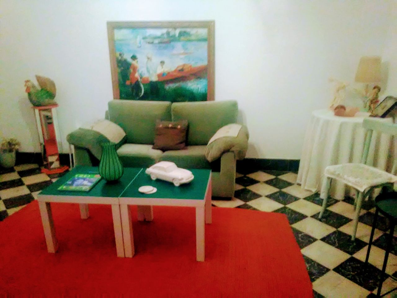 Sofá de dos plazas de velour verde